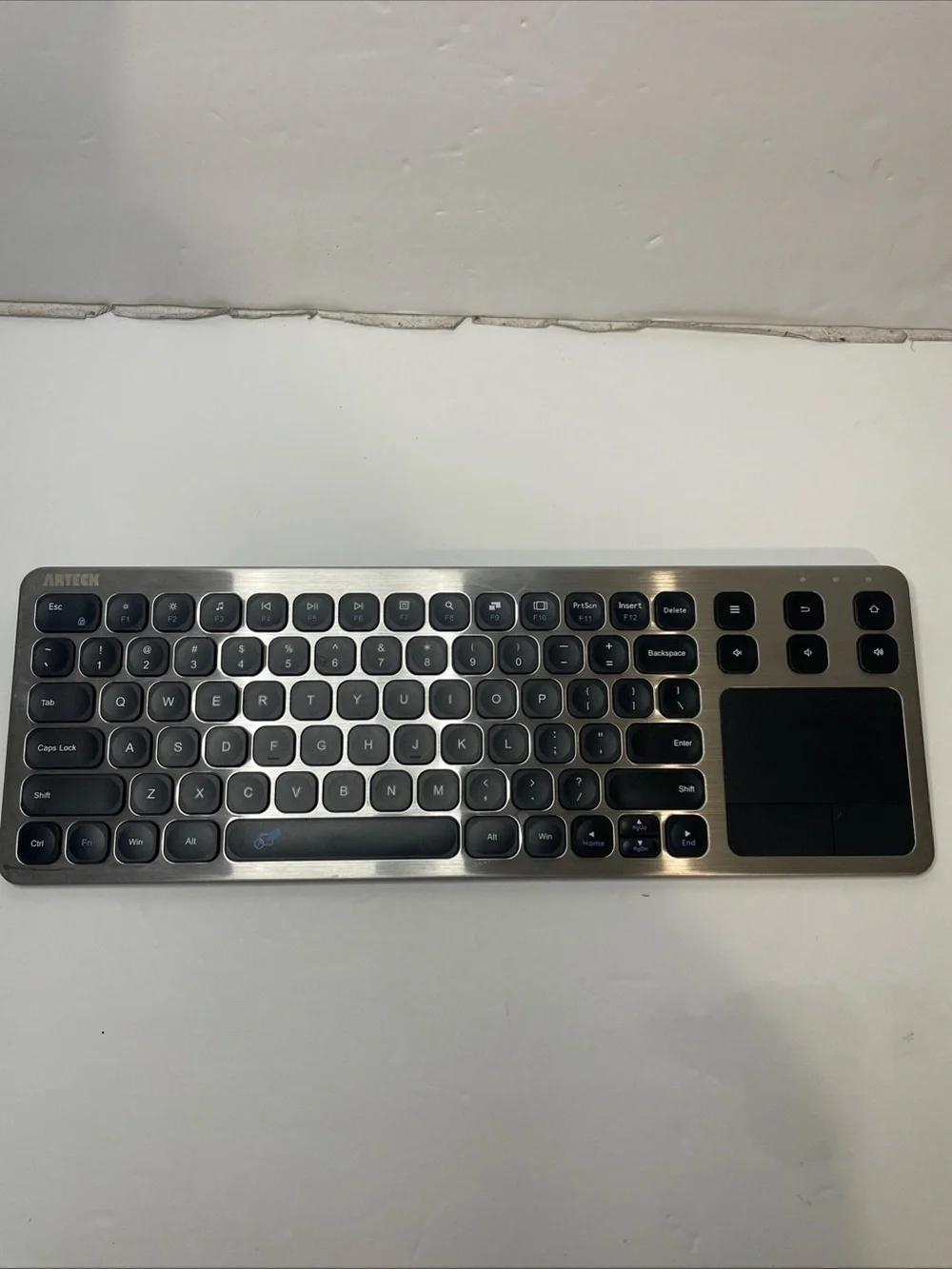 Arteck Wireless Slim Keyboard with Touchpad - Silver and Black